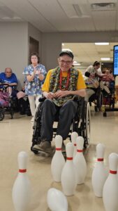A participant takes part in a bowling activity during the 2026 Talent Show on June 11.