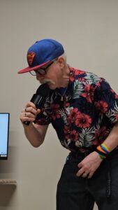 A participant sings into a microphone during the 2026 Talent Show on June 11.